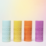 Load image into Gallery viewer, A graphic of four (4) Nözscreen sunscreen canisters side-by-side in a line.
